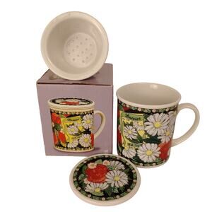 Daisies Hues and Brews Mug / Tea Infuser with Lid may be used as a coaster